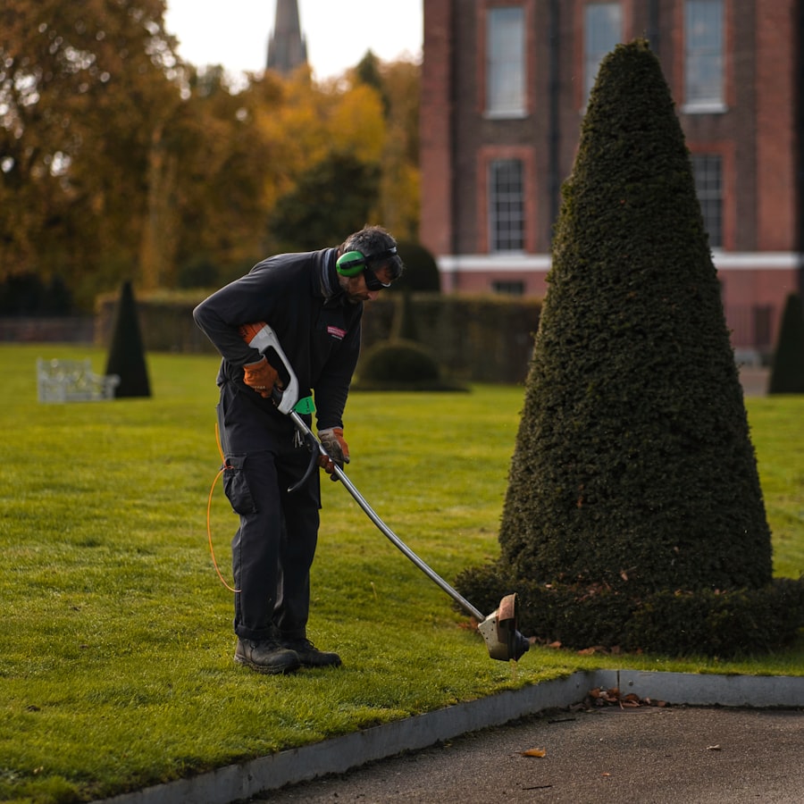 Groundskeeper maintaining formal gardens