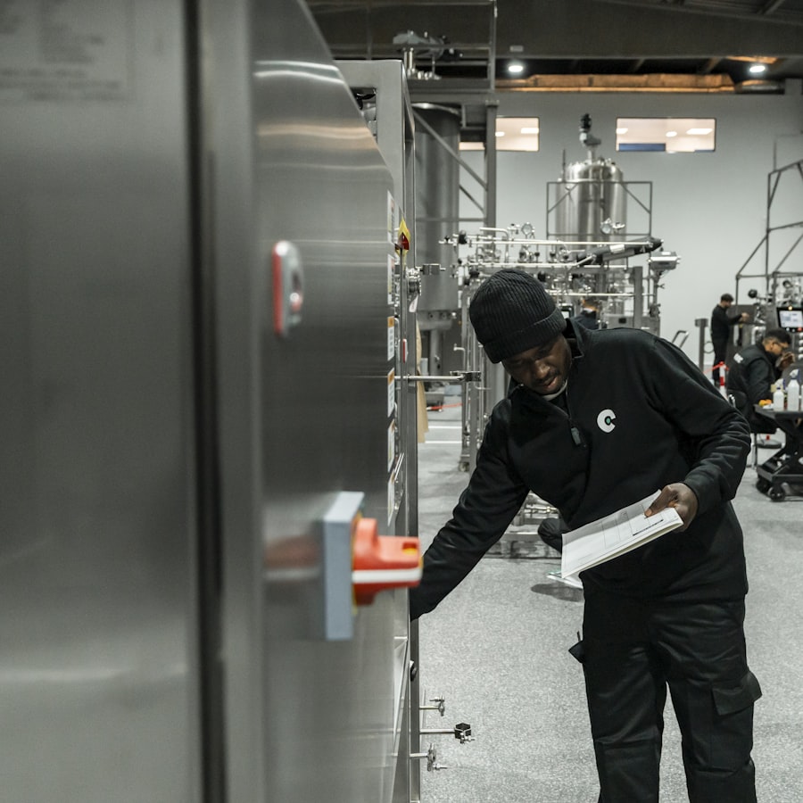 Technician inspecting plant room equipment
